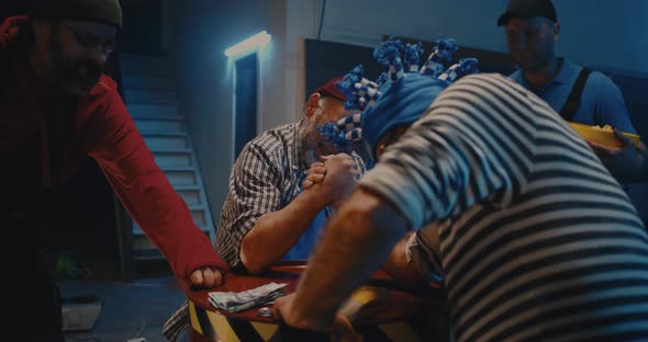 Strong Men Arm Wrestling for Money in Workshop alt