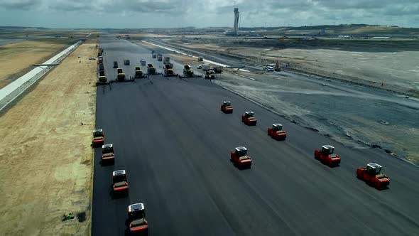 Construction Equipment Working On An Airport Runway alt