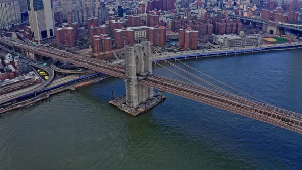 Brooklyn Bridge Traffic with View of Manhattan Skyline alt
