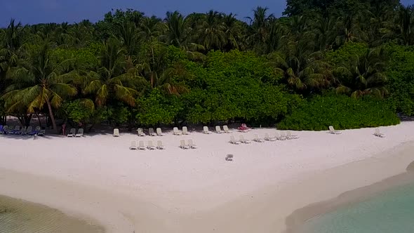 Drone view seascape of tropical coastline beach by blue sea with sand background alt