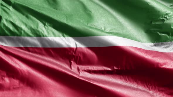 Tatarstan textile flag waving on the wind. Slow motion. 20 seconds loop.  alt