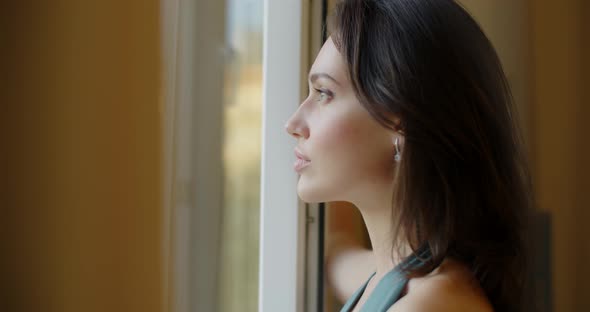 Close Up Side Portrait of Woman Breathing Fresh Air Indoors Before Starting Day Slow Motion. Profile