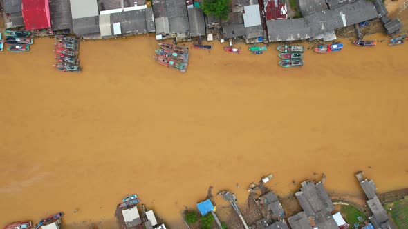 Aerial view over the river, harbor and fishing villages alt