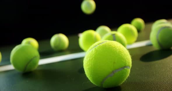 Tennis balls in court 4k alt