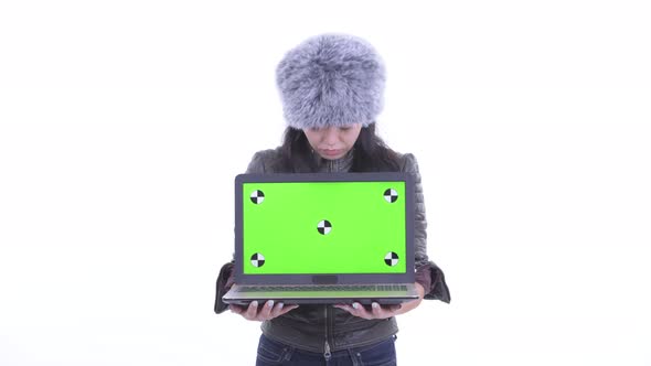 Stressed Asian Woman Showing Laptop and Getting Bad News alt