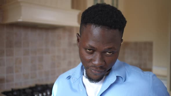 Headshot Portrait of Confident Young African American Man Smiling Looking at Camera Standing in alt