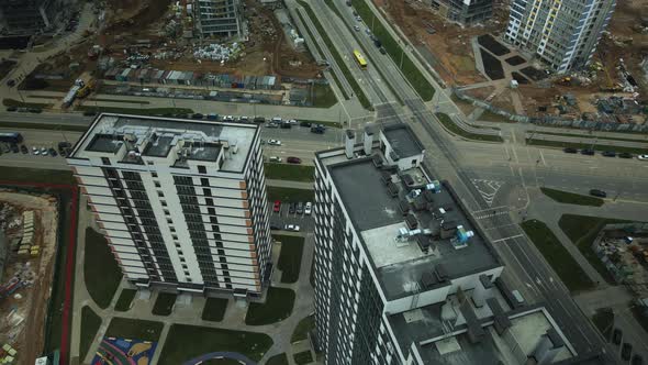 Construction of modern multi-storey buildings. Construction of a new city block. alt