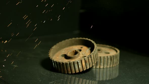 Sparks with gears in ultra slow motion  alt