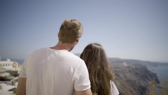 Young Sightseeing Couple in Santorini