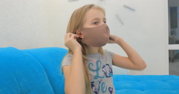 Girl Puts on a Mask