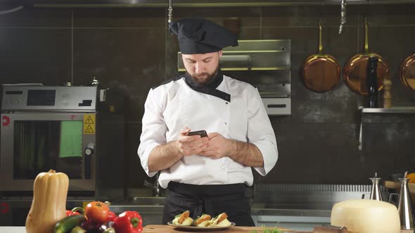 Chef in Uniform Take Break Before Cooking at Workplace