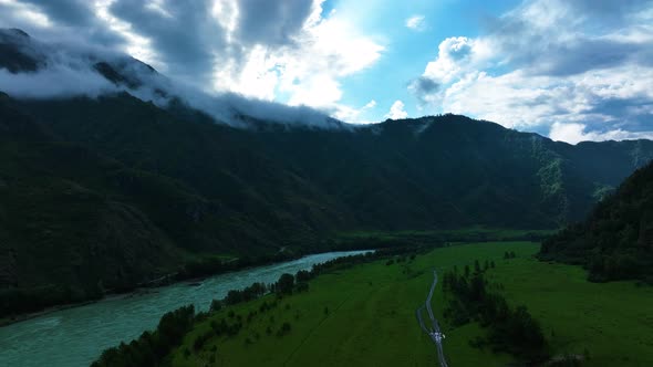 Landscape of mountains in summer. Fog. Aerial view