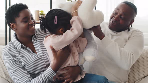 Happy Three Generation Afro American Family at Home Play with Teddy Bears Closeup Portrait alt