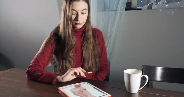 Talented Innovative Pretty Female Designer Sitting and Working at Desk. Contemporary Young Woman alt