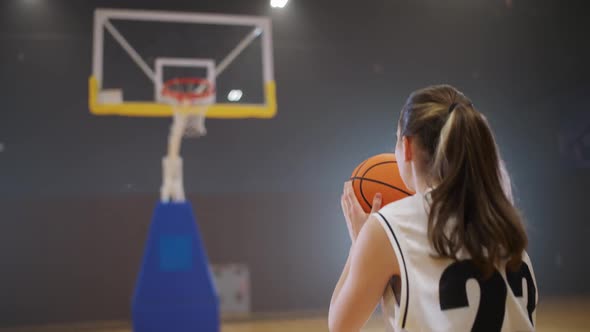 Sporty Lifestyle Basketball Training Game Female Player Successfully Throws a Basketball Into the alt