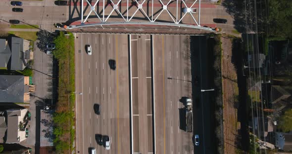 Aerial of cars on 59 South freeway in Houston, Texas on a bright sunny day alt