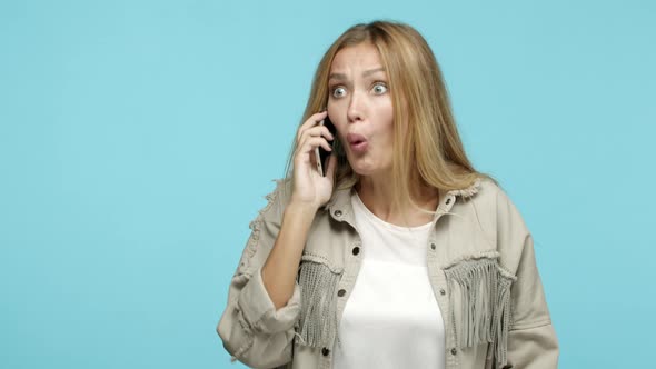 Slow Motion of Attractive Stylish Woman Talking on Mobile Phone Being Interrupted with Message