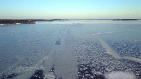The Frozen Sea Water of the Yacht Harbor in Helsinki