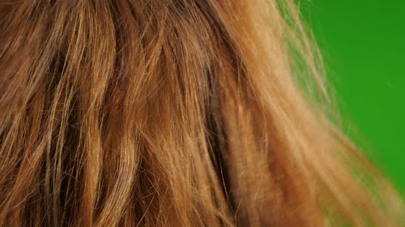 Blowing hot air with hair dryer in  front of green screen background 4K 2160p UHD video - Hair dryer alt