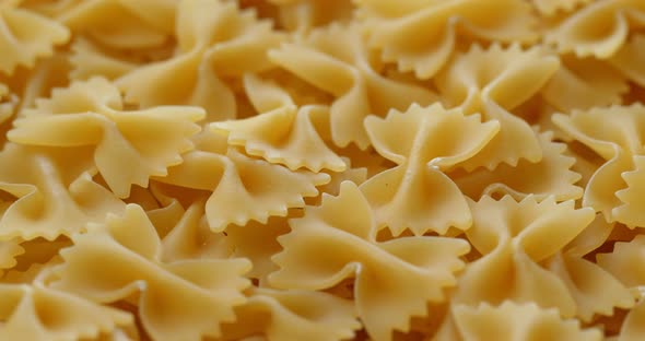Dry uncooked farfalle alt