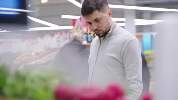 Customer in the Supermarket Needs Fresh Herbs alt