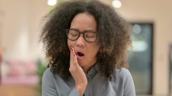 Portrait of African Businesswoman Having Toothache Cavity alt