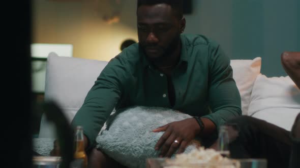 African American Guys Watching Match in Evening alt