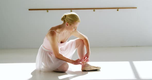 Ballerina wearing ballet shoes alt