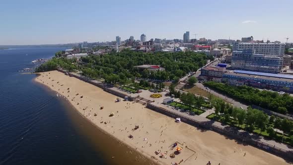 Aerial Panorama of Big Modern City on Shore of Wide River Volga in Russia