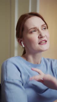 A Disabled Beautiful Woman is Listening to Music and Singing alt