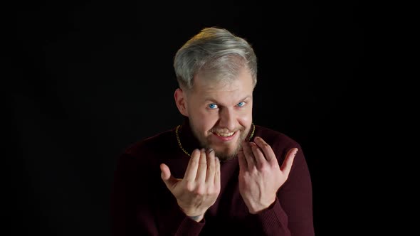 Stylish Playful Young Man Asks Join Him Follow Him Beckons with Inviting Hand Hugs Gesture alt