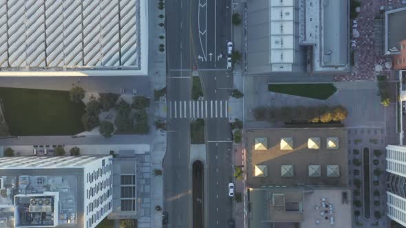 AERIAL: Slow Birds Eye View Flight Over Downtown Los Angeles California in Beautiful Sunrise Light alt