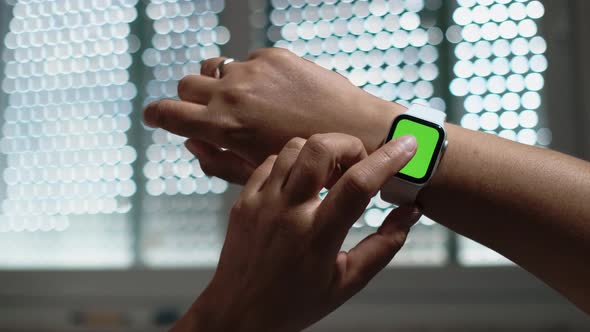 Smart Watch with Green Screen or Mockup Chroma Key on Female Wrist alt