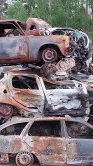 Vertical Video of the War in Ukraine  Destroyed Cars alt