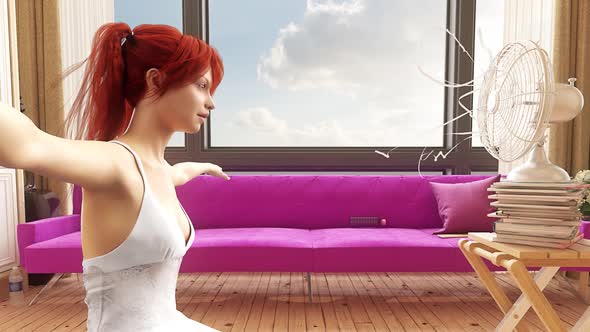 A redhead girl is sitting in front of a fan