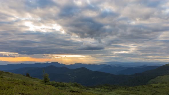 4k time lapse, clouds moving at the sunset time in mountains, nature landscape at high altitude