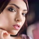 Closeup Face of Beautiful Hispanic Young Woman with Perfect Skin and Evening Makeup