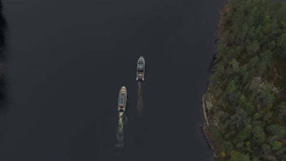 the Boat Floats Among the Skerries in Lake Lodoga Aerial Shot
