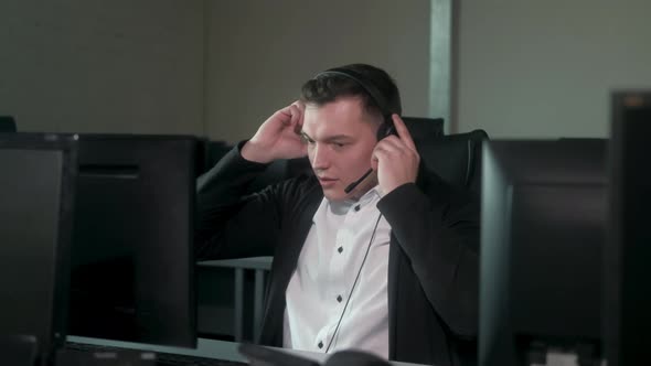 Operator is a young man working in a call center for VIP customer service.