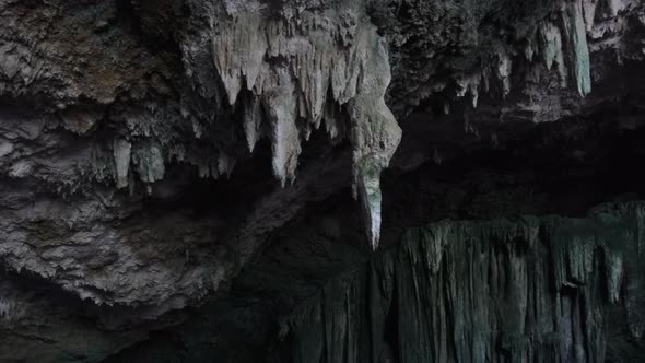 Underground Cave with Stalactite Rock Formations Hanging From Kuza Cave Ceiling alt