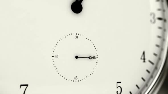 Time-lapse animation of a clock with the fast turning hand of clock. Closeup. HD alt