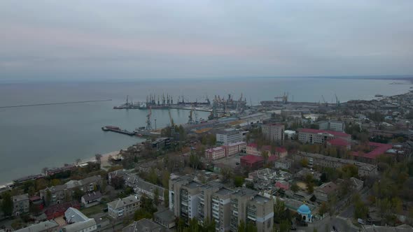 Drone Flies Over Seaside with Sea Port in Small Bay on Sea of Azov alt