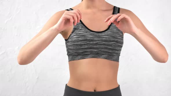 Torso of Active Sportswoman Turning Slim Body Exercising Isolated at White Studio Background alt