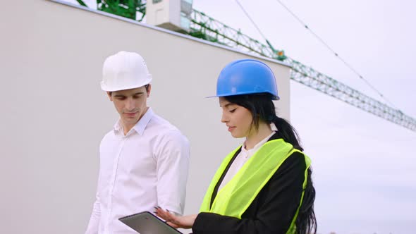 Construction Site Businessman and His Assistant alt