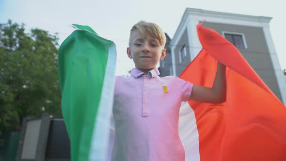 Italian Football Fan Waving National Flag, Cheering Team Outside, Championship