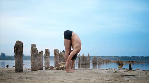Man Athlete Practicing Yoga