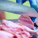 Man Cutting Grilled Veal Tenderloin on Cutting Board - VideoHive Item for Sale