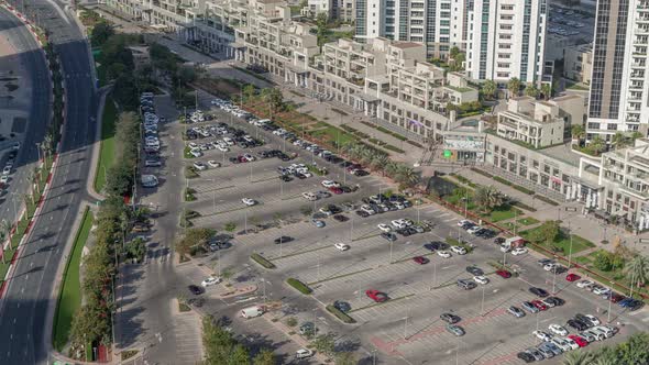 Aerial View Full Cars at Large Outdoor Parking Lots Timelapse in Dubai UAE alt