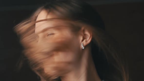 Beautiful Young Woman Happily Waves Her Hair From Side to Side Slowmo alt