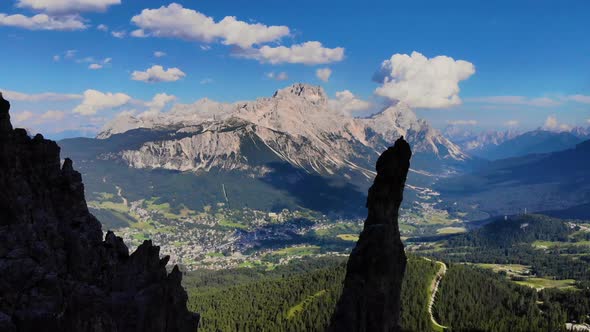 Dolomites Mountains Italy. Aerial view of Cortina d' Ampezzo surrounded by majestic mountains. alt